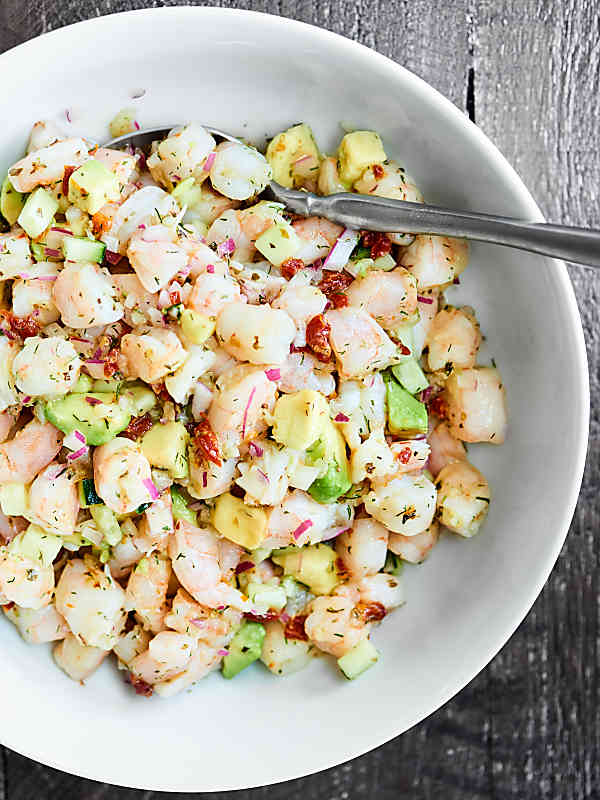 bowl of shrimp avocado salad above