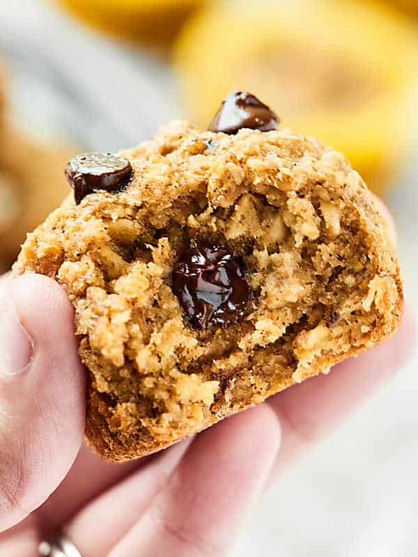 At only 115 calories, these are muffins you don't have to feel bad about! These Skinny Banana Chocolate Chip Muffins are naturally gluten free, vegan, ultra moist, and completely delicious! Nobody will ever guess these are healthy! showmetheyummy.com #skinnymuffins #healthymuffins