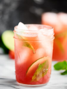 This Sparkling Watermelon Mojito is what summer is all about. Juicy watermelon, fresh mint, rum, and sparkling pinot grigio. . . so easy and refreshing! showmetheyummy.com Recipe made in partnership with @BarefootWine #watermelonmojito #pinotgrigio