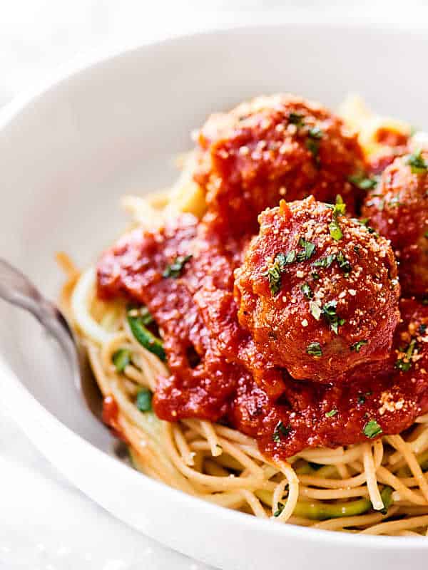 At only 60 calories, these Turkey Meatballs are the perfect, healthy, easy, weeknight meal. These are made without breadcrumbs, are gluten free, and are so juicy! showmetheyummy.com #glutenfree #turkeymeatballs