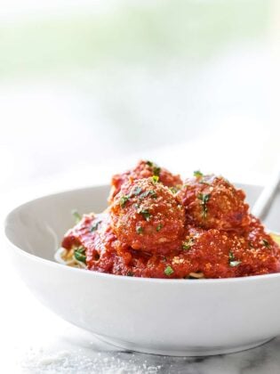 At only 60 calories, these Turkey Meatballs are the perfect, healthy, easy, weeknight meal. These are made without breadcrumbs, are gluten free, and are so juicy! showmetheyummy.com #healthy #turkey #meatballs
