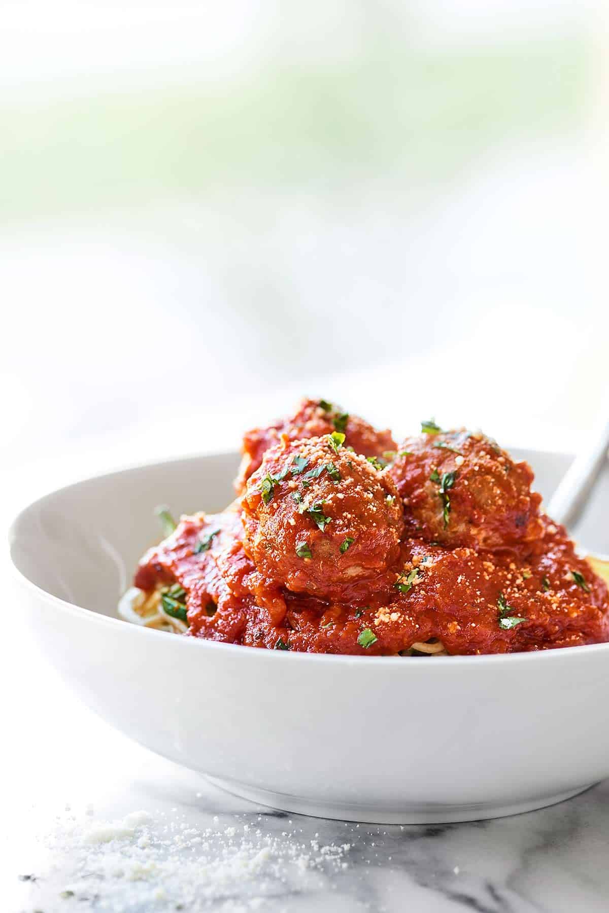 Turkey meatballs over bowl of spaghetti