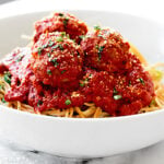 At only 60 calories, these Turkey Meatballs are the perfect, healthy, easy, weeknight meal. These are made without breadcrumbs, are gluten free, and are so juicy! showmetheyummy.com #glutenfree #turkeymeatballs