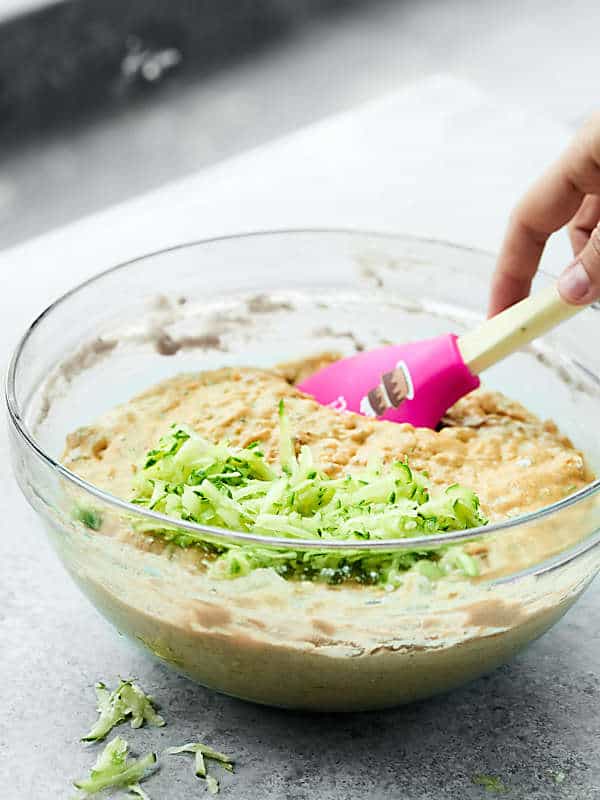 bowl of zucchini bread batter with spatula