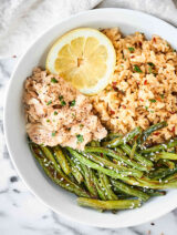 This Lemon Pepper Salmon with Coconut Brown Rice is ready in less than 20 minutes! Tender, lemony salmon is served with Thai inspired brown rice and green beans for a healthy and delicious meal! showmetheyummy.com Made in partnership w/ @chickenofthesea & @minutericeUS #NationalSalmonDay #SalmonLovesRice