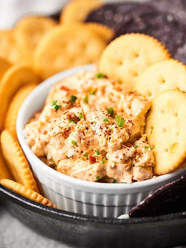 Closeup of bowl of dip with crackers