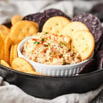 This Crack Dip is highly addictive. You've been warned. ;) Full of cream cheese, bacon, sour cream, spices and more, you're never gonna want to stop eating it! showmetheyummy.com #crackdip #baconappetizer