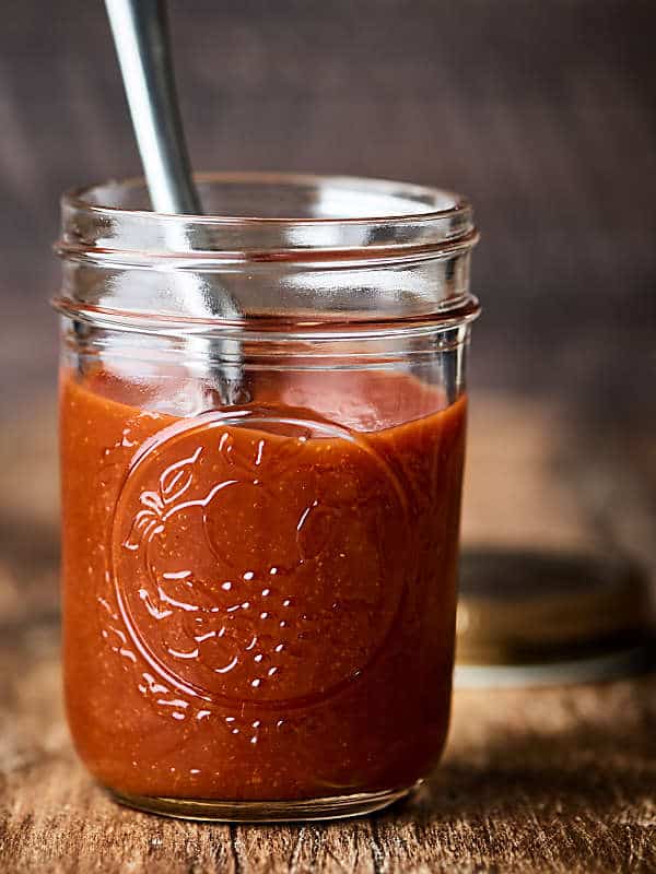 sloppy joe sauce in mason jar with spoon