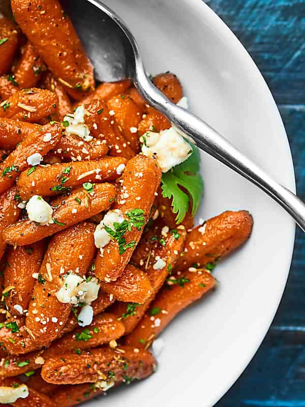 honey roasted carrots on a plate above