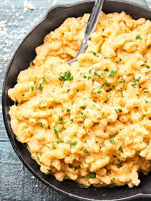 #ad This Slow Cooker Mac and Cheese takes minutes to put together and is full of FOUR kinds of cheese: Asiago, Sharp Cheddar, Monterey Jack, and Gouda, which makes this the best holiday side dish! showmetheyummy.com Made in partnership w/ @Crystal_Farms #cheeselove #CrystalFarmsCheese #slowcookermacandcheese