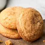 We're making Chewy Ginger Cookies for day TWO of Christmas Cookie and Candy week. These cookies are chewy, a little crunchy, totally fluffy, perfectly spiced, and sweetened with maple syrup! showmetheyummy.com #christmascookies #gingercookies