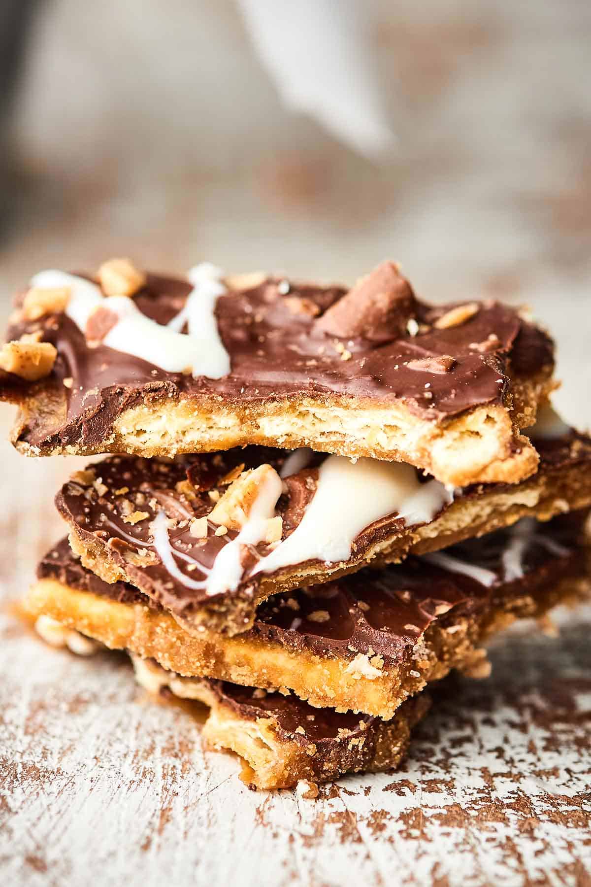 Add this Christmas Crack (aka Easy Saltine Toffee Candy) to your holiday baking list! Only 6 ingredients necessary to make the most addicting holiday treat yet! It's the perfect combo of sweet/salty/crunchy! showmetheyummy.com #christmas #candy #christmascrack #saltinetoffee