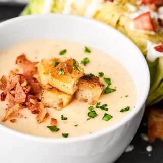 #ad A classic wedge salad with a tangy, sweet blue cheese dressing is paired with the creamiest potato soup to celebrate National Soup Month! showmetheyummy.com Made in partnership w/ @idahoanfoods #wedgesalad #potatosoup
