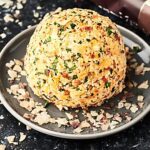 #ad A twist on a classic, this Potato Chip Cheese ball is full of cream cheese, goat cheese, cheddar cheese, bacon, spices, and yes, POTATO CHIPS! :) showmetheyummy.com Made in partnership w/ Kettle Brand Potato Chips