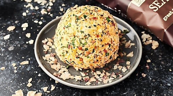 #ad A twist on a classic, this Potato Chip Cheese ball is full of cream cheese, goat cheese, cheddar cheese, bacon, spices, and yes, POTATO CHIPS! :) showmetheyummy.com Made in partnership w/ Kettle Brand Potato Chips