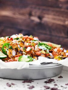 Loaded Chicken Nachos Recipe - Crockpot Chicken, Vegetables, & More!