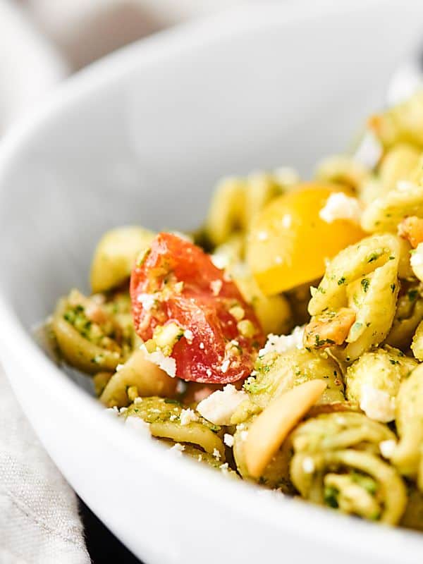 closeup of pesto pasta salad