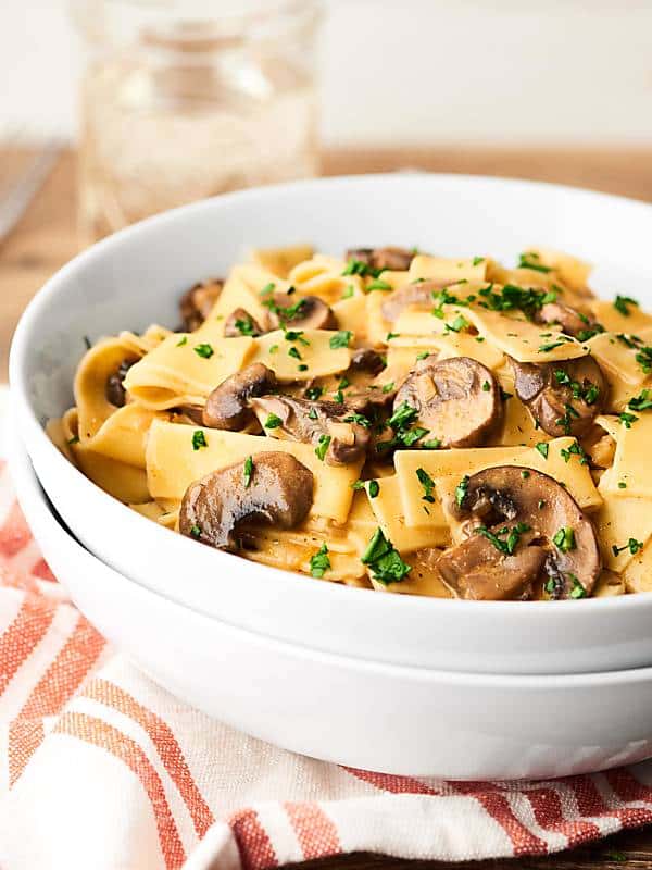 This Vegan Mushroom Stroganoff Recipe is a healthy twist on the classic beef stroganoff & it's loaded w/ mushrooms, spices, almond milk, & a little wine! showmetheyummy.com