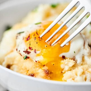 #ad Breakfast Mashed Potato Casserole. Full of sausage, mashed potatoes, panko, and eggs, it's easy, indulgent, and delicious! showmetheyummy.com Made in partnership w/ @idahoanfoods