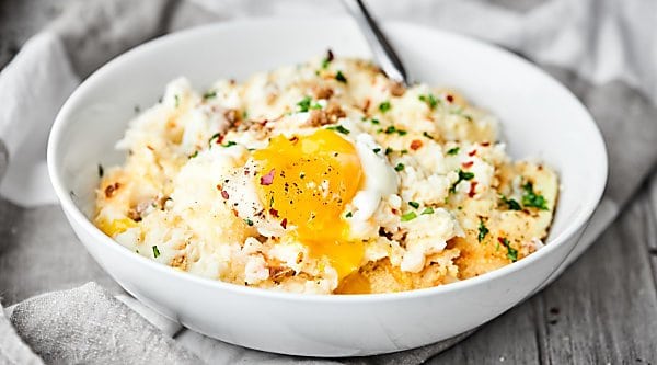 #ad Breakfast Mashed Potato Casserole. Full of sausage, mashed potatoes, panko, and eggs, it's easy, indulgent, and delicious! showmetheyummy.com Made in partnership w/ @idahoanfoods