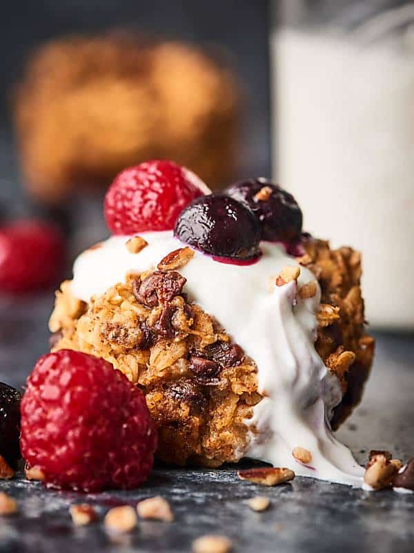 Healthy baked oatmeal cup with berries closeup