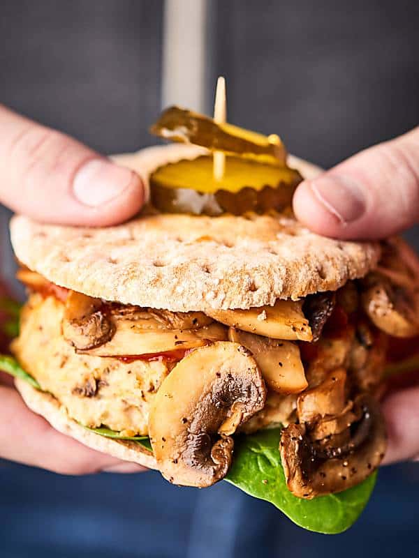 healthy turkey meatloaf sandwich held two hands