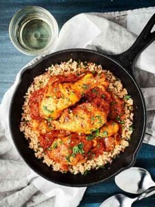 This Haitian Chicken Recipe is a one pot wonder! Full of chicken, tomatoes, wine, spices, and more, this recipe is easy and delicious! showmetheyummy.com