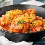 This Haitian Chicken Recipe is a one pot wonder! Full of chicken, tomatoes, wine, spices, and more, this recipe is easy and delicious! showmetheyummy.com