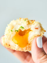#ad These Loaded Baked Potato Croquettes are full of fluffy Idahoan Signature™ Russets Mashed Potatoes, gooey cheese, salty bacon, and coated with crispy panko. A surprisingly easy, yet impressive appetizer for any occasion! showmetheyummy.com Made in partnership w/ @idahoanfoods