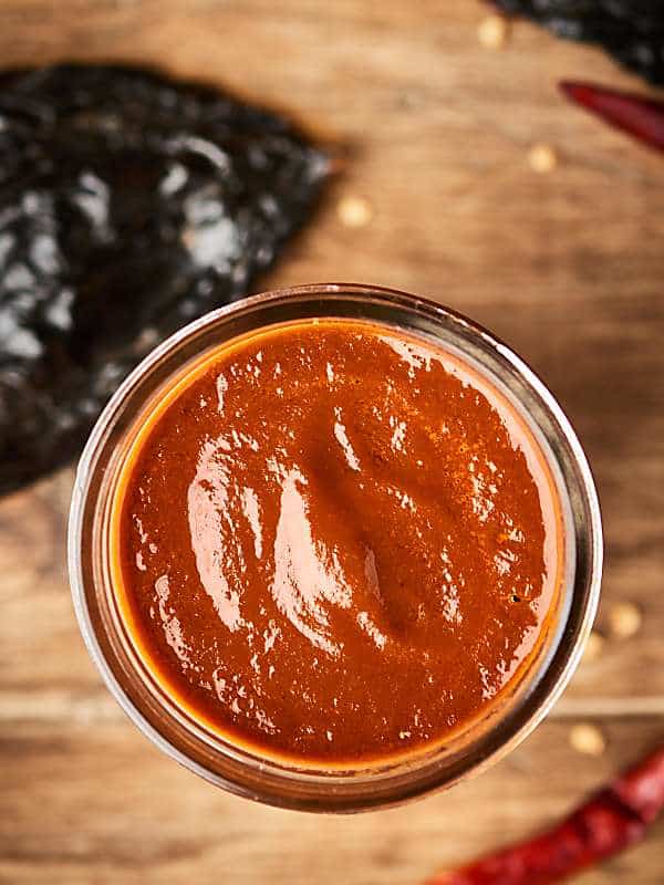 jar of spicy enchilada sauce above