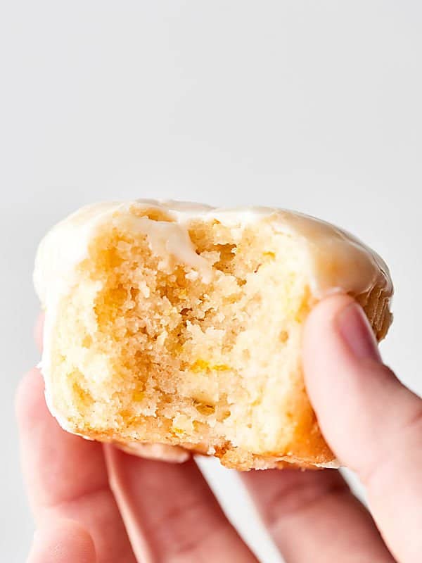 These Vegan Lemon Pound Cake Cupcakes are dense, moist, perfectly lemony, and smothered in the most delicious two ingredient glaze! A great dessert for warmer weather. showmetheyummy.com
