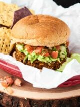 This Black Bean Burger Recipe is PACKED with vegetables and flavor and is super quick and easy to make. All you need is 10 minutes and a food processor! Vegan. Gluten Free. showmetheyummy.com #vegan #blackbean #burger