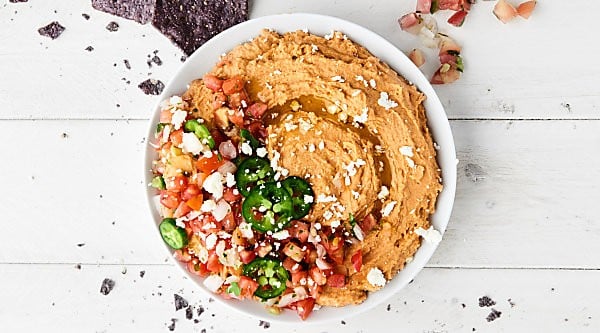 #ad Instant Pot Taco Hummus. Ultra creamy hummus loaded with canary beans, taco seasonings, and lime juice. Made quick and easy in your Instant Pot! showmetheyummy.com Made in partnership w/ @nutsdotcom