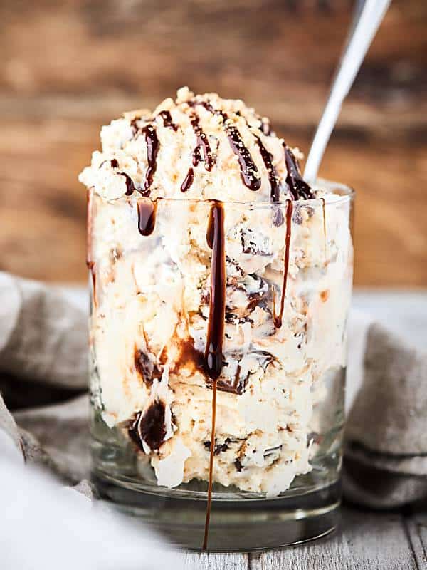 mug of smores ice cream with chocolate drizzle side view