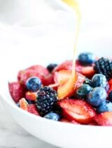Only 7 ingredients needed to make this Berry Fruit Salad. All your favorite berries + fresh mint + lemon juice and honey! So easy. So yummy! showmetheyummy.com #fruitsalad #berries