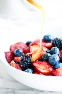 Only 7 ingredients needed to make this Berry Fruit Salad. All your favorite berries + fresh mint + lemon juice and honey! So easy. So yummy! showmetheyummy.com #fruitsalad #berries