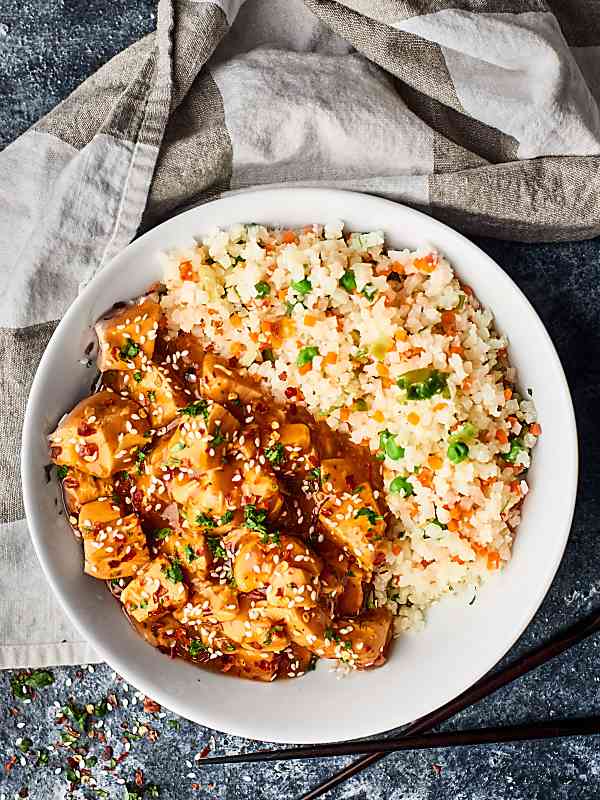 This Crockpot Sesame Chicken is a more flavorful, health-i-fied version of a take-out classic! One of my go-to throw and go, quick and easy recipes! showmetheyummy.com