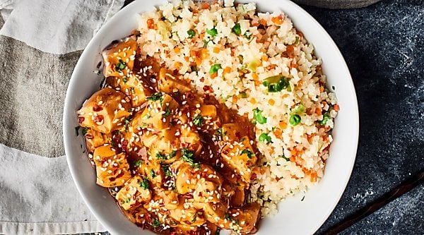 This Crockpot Sesame Chicken is a more flavorful, health-i-fied version of a take-out classic! One of my go-to throw and go, quick and easy recipes! showmetheyummy.com