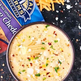 #ad This Easy Cheesy Corn Chowder is loaded with potatoes, sweet corn, creamed corn, bacon, and three kinds of cheese! 20 minute, 1 pot meal! showmetheyummy.com Made in partnership w/ @crystalfarms #cheeselove #CrystalFarmsCheese