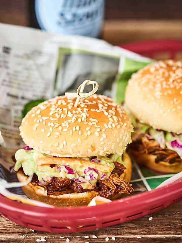 Two instant pot pulled pork sandwiches in a basket