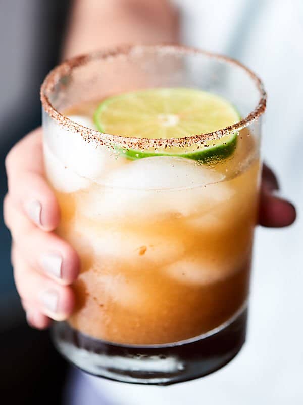 #ad This Tamarind Margarita Recipe is a unique twist on a classic! Full of tamarind paste, lemon juice, lime juice, agave, and tequila and lined with a chili salt rim! showmetheyummy.com Made in partnership w/ @nutsdotcom