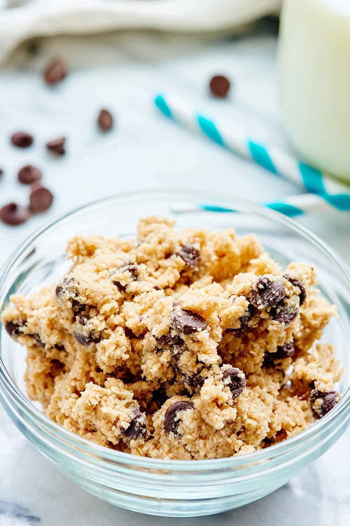 This Edible Cookie Dough Recipe is eggless and safe to eat raw! Theres no flour, we use homemade oat flour instead, & no eggs! Easy edible cookie dough for the win! showmetheyummy.com #cookiedough #dessert #eggless