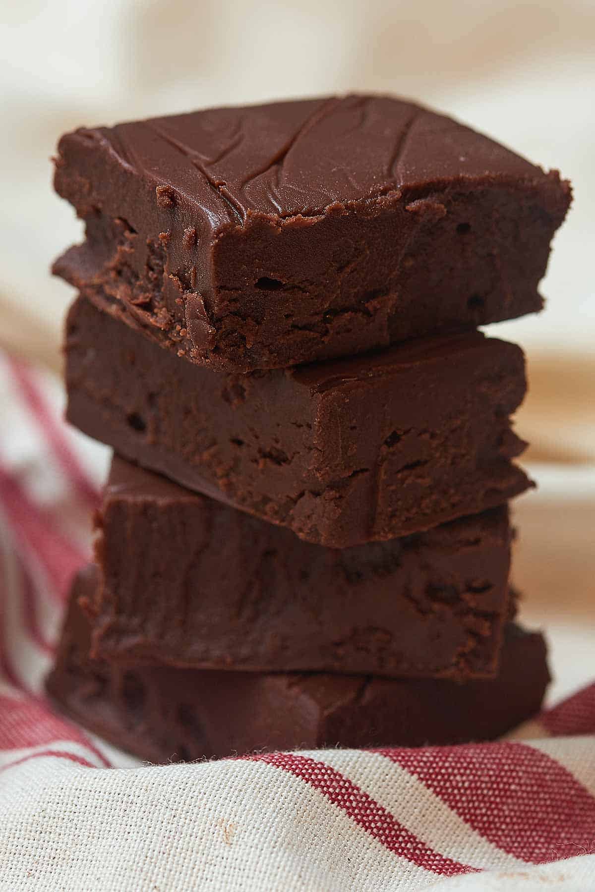 Four pieces of fudge, stacked