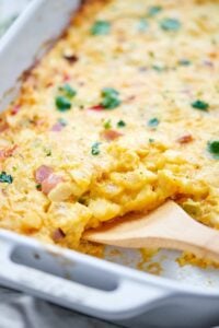 This Ham and Cheese Breakfast Casserole Recipe is SO quick & easy (less than 10 minutes of prep) and full of hash browns, eggs, ham, and plenty of cheese! showmetheyummy.com #breakfast #casserole