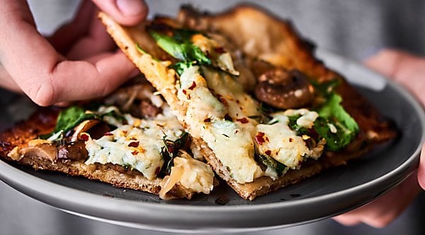 #ad Caramelized Onion and Mushroom Pizza. Thin crust topped with onions, mushrooms, spinach, tons of cheese, and a little thyme! showmetheyummy.com Made in partnership w/ @Pillsbury #Pillsbury