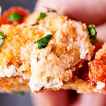 #ad A classic turned into a dip, this Chicken Parmesan Dip is SO yummy! Chicken tenders, cream cheese, mozzarella, panko, and more! showmetheyummy.com Made in partnership w/ @redgoldtomatoes #HelpCrushHunger
