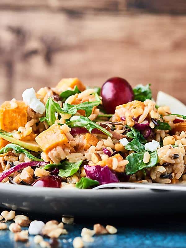 sweet potato and wild rice salad piled on plate side view