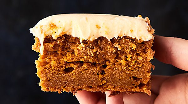 Easy Pumpkin Bars Recipe with Cream Cheese Frosting. These bars are ultra dense and full of all your favorite pumpkin pie spices! Topped with the smoothest, tangy cream cheese frosting! showmetheyummy.com