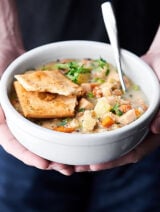 #ad This Healthy Turkey Pot Pie Soup is a lightened up version of a classic! Loaded with leftover holiday turkey, veggies, black eyed peas, cozy spices, and topped with leftover pie crust! showmetheyummy.com Made in partnership w/ @USAPulses @PulseCanada