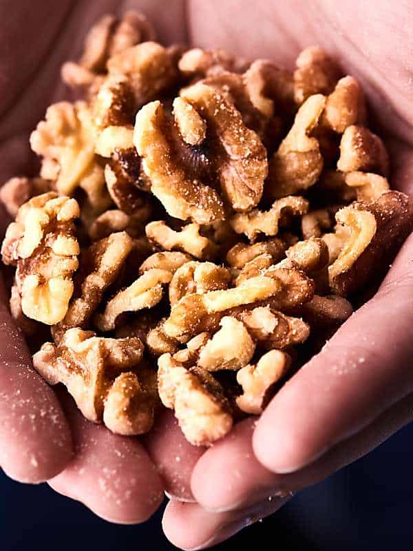 walnuts held in two hands